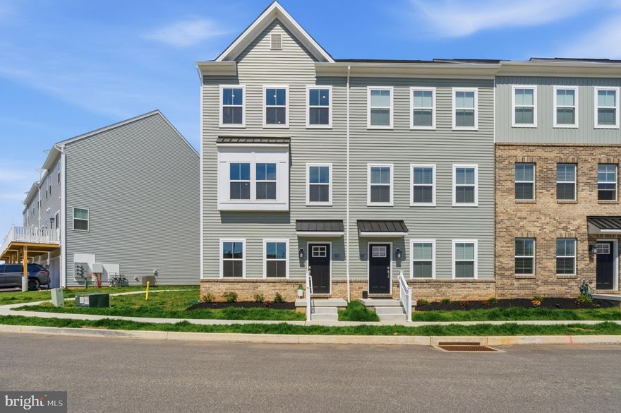 Welcome to 65 E Front Street! A stunning Cambridge Luxe model, an exceptional, move-in ready end-unit townhome in the highly sought-after River Pointe community, where modern luxury, thoughtful design, and low-maintenance living come together seamlessly. As one of the largest and most desirable floorplans in the community, this beautifully crafted residence offers 3 spacious bedrooms, multiple flexible living areas, 2 full baths, and 3 half baths across four impeccably finished levels. Designed to feel expansive and bright, the home is filled with natural light from oversized windows and enhanced by top of the line finishes everywhere. The entry level welcomes you with a versatile flex space complete with a powder room and closet. This space is perfect for a fourth bedroom, private office, gym, or media room, and it offers convenient access to the attached two-car garage. The main level is the true heart of the home, featuring soaring 9-foot ceilings and a seamless open-concept layout ideal for both everyday living and elevated entertaining. The designer kitchen impresses with upgraded 42” soft-close cabinetry, sleek quartz and granite countertops, stainless steel appliances, and an oversized island/peninsula with generous overhang seating. The space flows effortlessly into a dedicated dining area and expansive great room, while sliding doors lead to a private composite deck—perfect for enjoying peaceful mornings or evening gatherings. An additional powder room adds convenience. Upstairs, the luxurious primary suite is privately positioned, offering a spacious walk-in closet and a spa-inspired en-suite bath with dual vanities and a beautifully finished tiled shower. Two additional bedrooms provide flexible living options for guests, work-from-home needs, or fitness space, complemented by a well-appointed hall bath and a conveniently located full laundry area. The fourth level elevates the lifestyle even further with a versatile loft space, an additional powder room, and access to a private rooftop deck—creating the ultimate setting for entertaining or relaxing while taking in panoramic views. Beyond the home, River Pointe offers an unmatched lifestyle with community walking trails, a dog park, and a brand-new playground, all just steps away. Outdoor enthusiasts will love being only moments from the Schuylkill River Trail and Chester Valley Trail. Ideally located in the highly rated Upper Merion School District, you’re just minutes from King of Prussia, Conshohocken, and Philadelphia, with easy access to I-76, I-476, and Route 202, as well as world-class shopping, dining, and entertainment. Impeccably maintained, thoughtfully designed, and filled with natural light, this Cambridge Luxe offers the perfect blend of space, style, and convenience—an exceptional opportunity to own in one of the region’s most desirable communities.