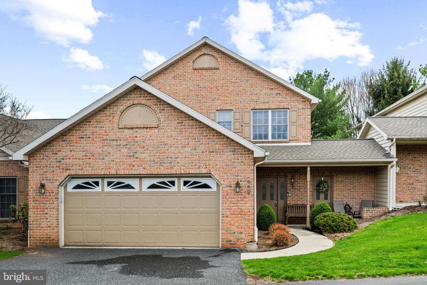 Spacious 3-bedroom, 2.5-bath brick townhome with a 2-car garage in the highly desirable Derry Township School District. A dramatic cathedral-ceiling foyer welcomes you inside, where French doors open to a private office with built-in shelving. The open-concept main living area features a cozy family room with a gas fireplace, a dining area, and an inviting eat-in kitchen designed for both everyday living and entertaining. The kitchen offers Corian countertops, a center island, pantry, recessed lighting, tile backsplash, double oven, and gas range. Step outside from the family room to enjoy the covered patio, perfect for relaxing or entertaining outdoors. The spacious primary suite serves as a true retreat with dual walk-in closets, double vanity, jacuzzi tub, and separate stall shower. The main level also includes a convenient laundry room with utility sink and cabinetry. Additional highlights include gas heat, central vac, ceiling fans throughout, ample closet and storage space, and a new garage door opener. Ideally located close to schools, shopping, churches, the hospital, and major roadways, this home offers a wonderful combination of comfort, style, and convenience.
