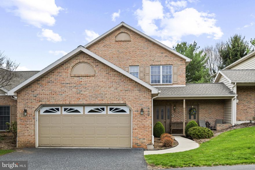Beautiful 3BR/2.5BA brick townhome with oversized 2-car garage in desirable Derry Township School District. Located in a quiet 20-unit community on a private road in one of Derry Township’s most desirable neighborhoods, this home offers both privacy and convenience—just minutes from Penn State Health Milton S. Hershey Medical Center, grocery stores, schools, shopping, and major routes.  A large, bright two-story foyer welcomes you into the home, featuring French doors leading to a private office with built-in desk and shelving. The open-concept layout includes a spacious family room with gas fireplace and dining area, flowing into a bright eat-in kitchen complete with Corian countertops, center island, walk-in pantry, double oven, gas range, and abundant workspace for cooking and entertaining.  The spacious primary suite offers two large walk-in closets, double vanity, jacuzzi tub, and separate stall shower.   A large first-floor laundry room adds exceptional convenience with a utility sink, built-in ironing station, hanging rack, and abundant cabinet storage.  In addition to the home’s generous closet space, there is an adjacent storage room with dual access from both the front and rear of the property. The oversized 2-car garage also includes built-in storage above for even more functionality.  Enjoy the quiet, private backyard from the covered porch/patio, complete with an in-ground gas hookup for grilling and outdoor entertaining. Additional features include gas heat, central vac, ceiling fans throughout, and ample storage space. HOA services include lawn care and snow removal, providing easy, low-maintenance living year-round. This home offers the perfect blend of comfort, style, storage, and location.