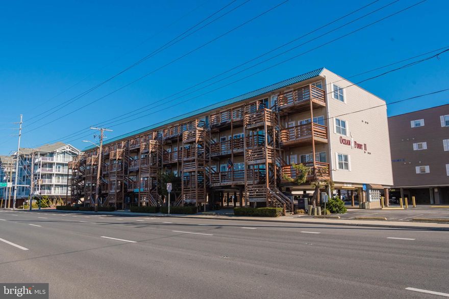 A loan mistake is your big break! Now this sweet, midtown condo, kept in pristine condition, on the oceanside, is back and ready for your weekend getaways or to rent when you want to earn extra income! There is always a demand for a one bedroom that sleeps 6, with cozy bunk-beds, a Full, and a Queen sleep sofa! Central Air keeps you super cool in your 616 sq.ft. third floor corner of the sky, or open the windows and enjoy the breeze from your sunny windows. Fantastic Bay view for gorgeous sunsets, and the thrill of seeing "Seacrets" fireworks from your balcony!  Great location to see the OC Air Show on your beach just one block away! Super close to some of the best crab shacks, "On the Bay" and "Belly Busters."  Close to Coconuts, beach bar and grill! Go from beach to happy hour just a few short blocks from your 41st beach! Sunsets to starry night beach time! Boardwalk, Fish Tales and Jolly Rogers about 15 blocks South! Seacrets, Macky's, Fagers Island just North! Location, location! Must see inside! Seller includes Home Warranty! This sold in a day and now it's back, for a qualified buyer who loves the best of OCMD, at a great new price!