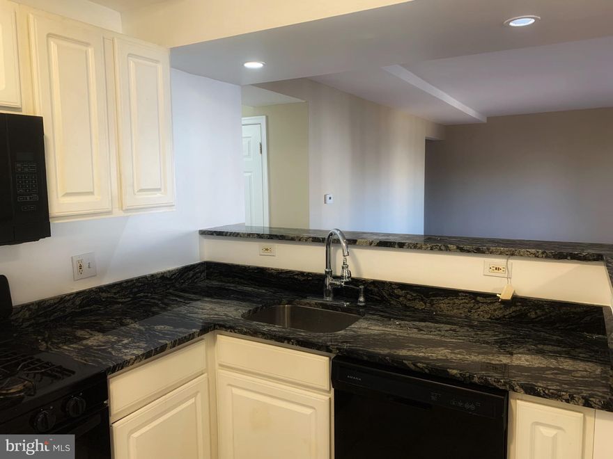 This spacious 2-bedroom, 2-bathroom condo in a charming garden-style building offers 1,000 sq. ft. of comfortable living space. The home features hardwood flooring throughout the main living areas, with cozy carpeted bedrooms for added comfort. Enjoy the convenience of central air conditioning and heating, an in-unit washer/dryer, and modern gas appliances. The primary bedroom includes an in-suite bathroom with a walk-in shower, and the kitchen is fully equipped with a dishwasher, garbage disposal, and ample cabinet space. Step through elegant French doors onto your private balcony, perfect for unwinding after a long day.

Nestled in a quiet section of a bustling city, this condo offers easy access to shopping, entertainment, public transportation, and major highways, including I-495 and Route 50.

Offers will only be considered by prospective buyers who intend to live in the unit as an owner-occupant. This Association is financially sound and has some of the lowest condo dues in Prince Georges’ County. Seller will provide Home Warranty for 3 years! Seller is also willing to provide additional closing assistance.