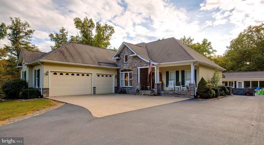 Turn-key rambler on private 7.92 acre setting.  Brazilian cherry hardwood flooring & 12 ft ceilings on main level.  Light & bright w/ windows throughout.  Granite, SS appliances & custom backsplash in kitchen.  Stacked stone fireplace in FR.  Rear sunroom. Fin lower level w/walkout. Outdoor lovers paradise featuring pool, pool house, grilling area, putting green & trails! Must see to appreciate!