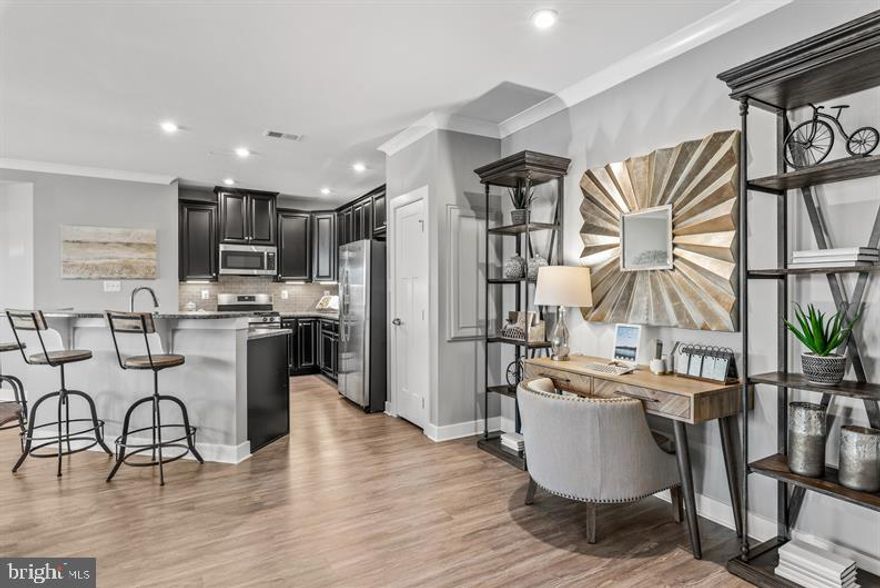 This home is to be built June 2021 estimated move in Last chance to customize finishes. Embrace the convenience of a condo with all the comforts of home! Enjoy your own private 1 car garage & driveway, 1-level living with open design, gourmet kitchen w/ 2-tier island, private covered porch, panoramic views in primary suite, and so much more! Built with upgraded 5 inch  engineered hardwood, luxury tile, granite in kitchen and both baths,  42 inch kitchen cabinets. Community features endless amenities   truly resort-style living! Photos are representative