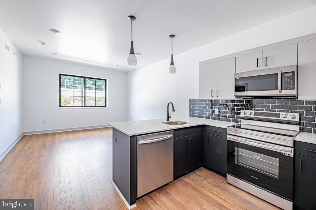 Photo of 5001 Umbria Street #U402, PHILADELPHIA, PA 19128 (MLS # PAPH2552130)