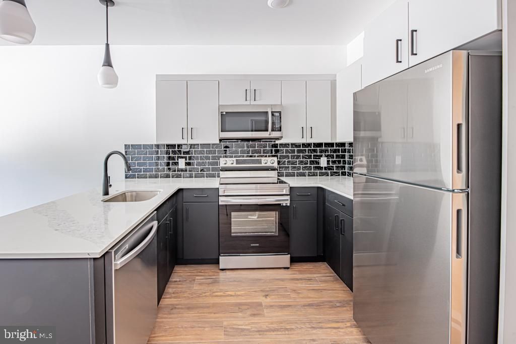Photo of 5001 Umbria Street #U402, PHILADELPHIA, PA 19128 (MLS # PAPH2552130)