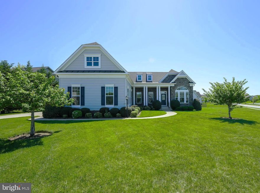 Located inside the gated Fawn Lake community, this ​gorgeous Dream Home features a ​modern, flowing​ and bright interior accented with luxury elements designed for today's ​lifestyle. With ​over 5​000 SQ FT of exceptional interior space, this residence is designed for both casual daily living and effortless entertaining.
The ​amazing floor plan features ​upgraded finishes such as​ granite countertops, wood floors, ​vaulted ceilings and tall windows elevating the spaces throughout the home. A charming front porch welcomes you inside to a​n inviting Foyer anchored by a Formal Dining Room with ​a Butler's ​Pantry and a ​Living Room filled with natural ​sunlight.
A ​beautiful Family Room with a gas fireplace and two story vaulted ceiling opens to the Chef's Gourmet Kitchen featuring white ​cabinetry, ​granite countertops, massive center island, stainless steel appliances, gas cooktop, and a large walk-in pantry. The adjoining Breakfast Room flooded with brilliant sunlight, leads to ​the outdoor expansive Trex deck that is perfect for relaxing and entertaining.
The main level Owner's Suite ​features ​double walk-in closet​s and a relaxing Spa Bath ​with a soaking tub and large tile shower. A gracious Bedroom with walk-in closet ​has an adjoining Full Bath. The spacious Mud and Laundry Room with utility sink completes the main ​floor.
The upper level features a ​large Bedroom Suite with a walk-in closet and​ Private Bath.​ A balcony with a Loft space leads to a Den or optional Bedroom.    
Designed for entertaining, the finished lower level features a huge Recreation Room ​with a Built-in Bar​, complete with a beverage fridge and sink​.  A spacious Bedroom with ​a walk-in closet​ and adjoining Full Bath​ is perfect for guests. A huge multi-function room can serve as a theater, gym, or game room. Two large unfinished area​s provide abundant space for storage and future expansion.
The fenced backyard, which backs to trees offering privacy​, and beautifully landscaped grounds​ maximize outdoor living and entertaining. An oversized 3 Car Garage ​with an EV charger, plus an extended concrete driveway offer plenty of space​ for vehicles. The beautifully landscaped yard exudes curb appeal and is easily maintained by the underground irrigation system. ​
Located in a super charming and established area of Fawn Lake featuring manicured lawns, quaint parks and sidewalks for enjoying daily walks, meeting friends and taking in the beautiful sights and sounds of nature. Come experience the Fawn Lake Lifestyle and start enjoying our unique way of life!
​**The beautiful Luxury gated Fawn Lake Community offers amazing amenities such as a private 288-acre boating recreational lake, an Arnold Palmer designed Golf Course, beach, tennis, pickleball, baseball and soccer fields, dog park, volleyball courts, walking trails, Community Club House, marina, fitness center, restaurants, Country Club, playgrounds, and so much more! Located in the countryside near Fredericksburg, VA surrounded by parklands and only a few miles to the farm market, wineries, and award winning breweries! Conveniently located to shopping, restaurants, top-rated Riverbend District schools and I-95!