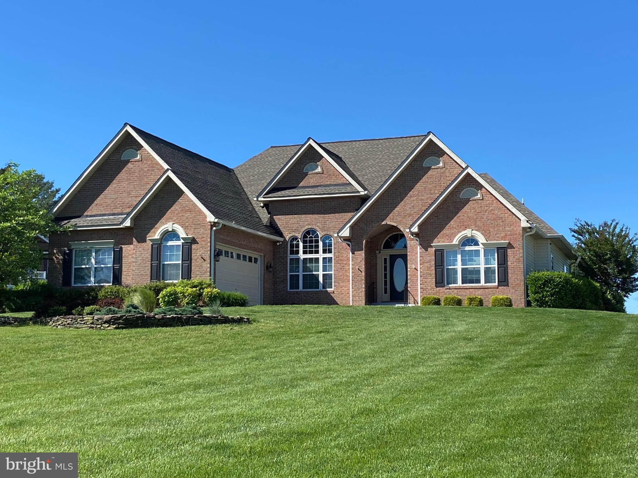 Nestled within the coveted Fairview Estates community, this custom rambler rests on a meticulously landscaped one-acre lot, offering a seamless blend of comfort and convenience. Designed for single-level living, the residence boasts an open layout ideal for effortless entertaining and relaxation. Upon entering, you will discover soaring ceilings, hardwood floors, intricate trim work, a formal dining room, and a spacious family room. The highlight of this home is the expansive rear screened porch providing a tranquil space to appreciate the beauty of the outdoors. The thoughtfully planned layout includes a primary suite with a fireplace, tray ceiling, and luxurious bathroom on one side, while two generously sized bedrooms and a full bathroom are situated on the opposite side, ensuring both privacy and comfort. The sizable lower level offers a partially finished area and an unfinished section ready for personalized customization and expansion, allowing for a tailored living space to suit individual preferences. Notable features of this property include paver patios, a 16x12 shed, raised garden beds, an irrigation system, a stamped concrete driveway, and a two-car garage. Conveniently located in Northern Calvert County, just off Route 4, residents benefit from easy access to a variety of shopping and dining options, simplifying daily errands and commuting to nearby metropolitan areas and military bases.