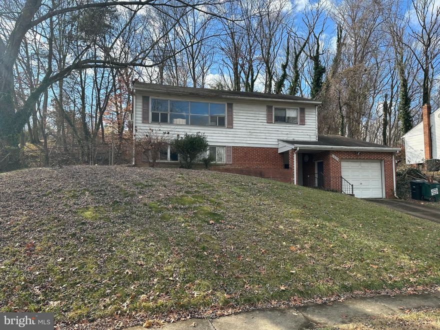 Property is being sold strickly as is.  Current owner has never lived in the house.  All items can convey with the house.  This is definitely a fixer upper and may have problems with financing except for a rehabilitation loan or cash. due to peeling paint and age of home.  Does not have CAC but has 2 window units that may work.  Oil heat with tank in the laundry room.  Located at the end of a culdesac offering lots of privacy    Backs up to trees .   Has an above ground pool which is not usable and will be responsibility of tbe new owner to remove .   2 bedrooms upstairs and full bath as well as 2 rooms in lower level which are not to code.  There was a leak on the ground level of the house in a water pipe which was repaired and  carpet removed
Tandem garage that could possibly accomodate 2 small cars or one car with additional  work space.  Please call listing agents with any questions.     With some work this property coud be the star of the neighborhood