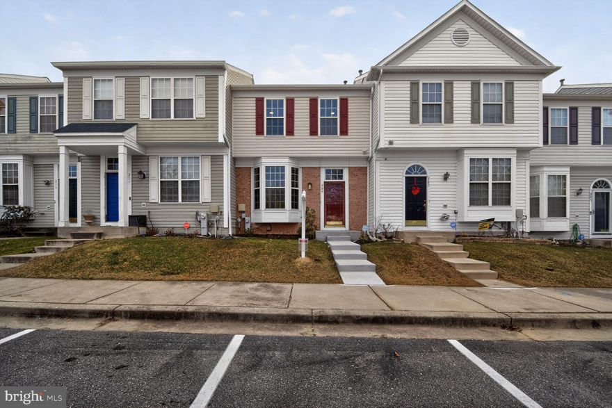 Spacious rowhome featuring 3 bedrooms 3.5 Baths! Finished Lower Level with fireplace, full bath, storage room and walkout  to patio that backs to woods!