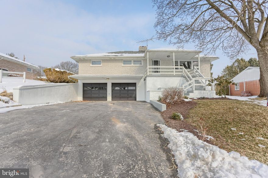 Absolutely Gorgeous ranch home in a quiet neighborhood!  Brand New Yorktowne kitchen, huge island all with countless cabinets and large drawers!  All soft close and able to store all of your pots and pans.  Granite and tile backsplash just installed by one of the finest contractors in Berks County.  4 bedrooms including a large master bedroom with a half bath and patio slider doors that exit to a covered patio and beautiful backyard.   New full bath with Double bowl vanity and granite counter topBrand new flooring throughout!  Wall to wall carpet in every bedroom and a beautiful water resistant laminate throughout the rest of the home.  Fully finished basement with wet bar and large brick fireplace!  The basement entrance leads to a tiled mudroom and brand new 1/ 2 bath.  Oversized two car garage large workshop. Walk-up attic for storage and  large covered front porch.
