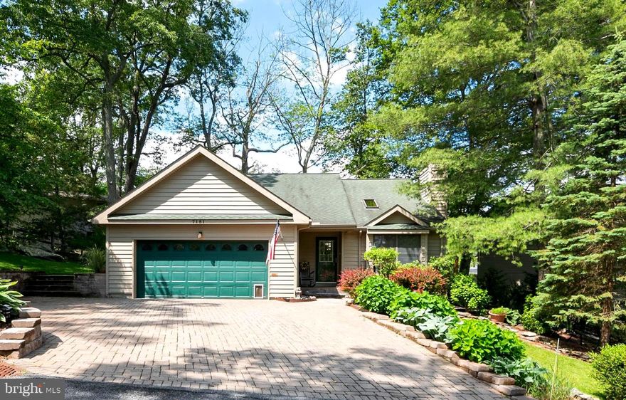 Situated on a partially wooded lot in the recreational community of Lake Linganore, this stunning contemporary home  features great room with cathedral ceilings, bright skylight and floor to ceiling fireplace. Lower level has  daylight family room with walkout, full bath and 2 additional bedrooms . Beautiful hardwood & LVP flooring through out the home! Driveway features custom pavers with room for 3 cars off street. Oversize 2 car garage.  Tens of thousands invested in upgrades such as:  Gourmet kitchen renovation completed in 2015 with Silestone counters,  downdraft cooktop in island and wine cooler.   Master bath spa-like renovation completed in 2019 features custom tile, and stone shower with custom glass door.  Maintenance free exterior siding, expansive hardscapes and 45 ft. multi-tiered deck to enjoy nestled amongst the trees.   HVAC replaced in 2018.   Community amenities create an  unmatched resort lifestyle at home.  1,200 acres of common area with beautiful lakes, 3 private beaches, 3 pools, boating, swimming, tennis, basketball, beach volleyball, nature trails, Farmers Markets, Summer Concerts, playgrounds and more.   There is a one-time $1,000 capital contribution fee to the HOA at settlement by Buyer.

Agents: Please submit offers by noon on Monday June 14th.