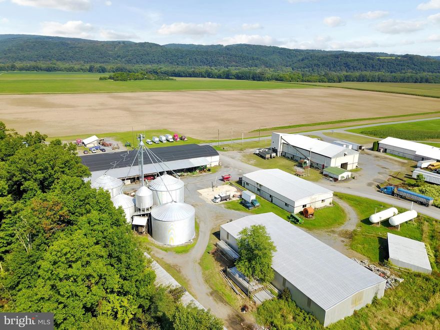 Unheard of in PA! Massive grain farm comprising of 685 acres class 1 river bottom soil located in southern Lycoming County with 2.5 miles of river frontage. Level ground with 5,400' of 8" buried irrigation pipe and hydrants throughout the property. One 1,800' section of linear irrigation, as well. Buildings included are 208' x 84' garage/shop, 62' x 126' equipment shed, 24' x 150' storage shed, 24' x 184' storage shed, and 22' x 34' storage shed. 95,000 bushels of dry grain storage (4 bins) with 1,500 bushel-per-hour leg, 1 In-bin grain dryer, and a continuous flow dryer. Property borders a small airport. Rare opportunity for a large parcel of tillable acres. Part of land is in Clinton County, Pine Creek Township 11. **This listing has been changed. Originally it was listed with a total of 685 Acres.  It has been changed to include a total of 445 acres which reflects the price drop as well.**