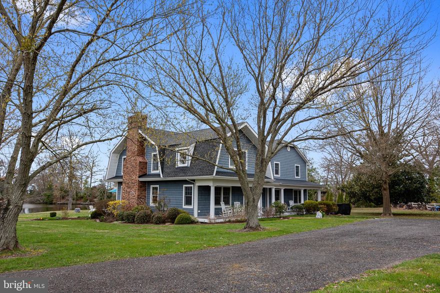 Welcome to your waterfront oasis on Porpoise ​Creek, nestled right off the serene Choptank River. ​This remarkable property boasts 8.25+/- acres of ​pure tranquility, offering a perfect blend of luxury ​living and natural beauty. Step into this exquisite 5-bedroom, 4 full & 1 half ​bathroom home and be greeted by stunning water ​views from nearly every room. The bright sunroom ​provides a picturesque backdrop of the backyard and offers direct access to the spacious back deck, perfect for entertaining or simply soaking in the ​serenity of waterfront living. The versatile layout of this home features a large primary suite upstairs, ​complete with its own private balcony overlooking the water. Additionally, a main-level en-suite bedroom ​off the living room provides convenience and flexibility for guests or multigenerational living. Hardwood flooring graces most of the home, adding warmth and elegance to the already inviting ​atmosphere. Outside, a waterside in-ground pool awaits, accompanied by a hot tub and a fully-equipped ​pool house boasting a large living area, a kitchen, and bathroom, ideal for hosting poolside gatherings or ​relaxing in style. For the equestrian enthusiast, a large fenced paddock with a pole barn offers ample space ​for your horses to roam and thrive in this idyllic setting. Outdoor lovers alike will appreciate the floating ​dock and kayak launch for exploring the creek.