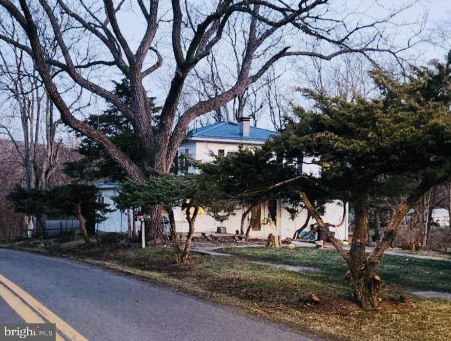 MASSIVE PRICE IMPROVEMENT! A home that has been present in the Town of Romney community for over 100 years is now available to enjoy as a new home or as an investment opportunity. The family selling this property have owned this large home for nearly 50 years. The location of this home is tucked in a quiet corner on the edge of town but is just a couple minutes drive to downtown Romney. Huge potential and ideal location!