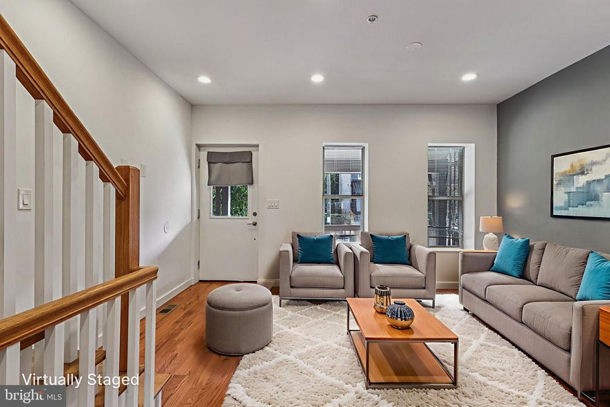 Qualifies for 100% financing, NO PMI, $5,000 lender credit, must be for primary residence! This beautifully updated 4-bedroom, 3-full bathroom home is the perfect updated row home in the perfect location for owner occupants for college students. All of this nestled in the vibrant and highly desirable University City neighborhood. With a fully finished basement, generous living space, and thoughtful upgrades throughout, this home is ideal for families, professionals, or investors looking for a turnkey opportunity. Step inside to discover an open-concept layout with hardwood floors, recessed lighting, and abundant natural light. The main level features a spacious living and dining area, leading into a sleek, updated kitchen complete with stainless steel appliances, quartz countertops, and ample cabinet space. A full bathroom and first bedroom on the main floor adds convenience for guests and everyday living. Make this a bedroom or home office space with it's own access to the backyard. Upstairs, you'll find three generously sized bedrooms and two more full bathrooms, including a primary suite with a private bath. The fully finished basement is perfect for guests or additional living space. There's also a dedicated laundry area and plenty of storage. Outside, enjoy a private rear patio—ideal for relaxing or entertaining—and a charming front porch for your morning coffee or enjoying the evening with friends. Located just minutes from University of Pennsylvania, Drexel University, CHOP, and Penn Presbyterian Hospital, this home is a commuter’s dream. Enjoy walkable access to Clark Park, Baltimore Avenue’s cafés and restaurants, Mariposa Co-op, local farmers markets, and nearby SEPTA routes for easy travel throughout the city.