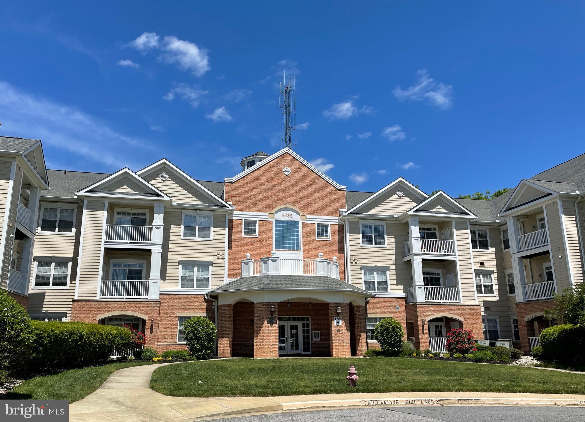 This 2 bedroom, 2 full bath unit is offered for sale in pristine condition, with private views of the woods from the balcony. Hardwood floors throughout the living room, dining room, and kitchen. Living room walks out to balcony overlooking the private, wooded area behind the building. Kitchen includes granite countertops, stainless steel appliances, and a spacious eat-in area. Master bedroom includes bay window, walk-in closet, and master bath with dual sinks. Unit comes with an assigned garage space beneath the building. Severna Park Gateway Village offers a workout room, community room and elevator to all levels. Short walk to Libation's, Ledo's Pizza, and more. Please note, this is a main level unit, but the balcony feels more like a 2nd story unit, as it does not walk out to the common area. The balcony is 6-8 feet above the common area below.