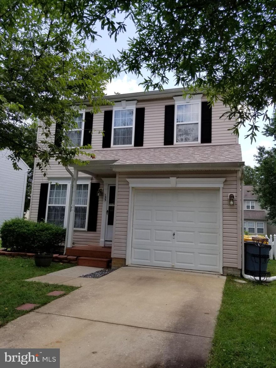 Enjoy living in this beautiful colonial in Grande View Park. Featuring 3 bedrooms, 2.5 bathrooms, and a 1 car attached garage. The open kitchen offers sliders to the rear fenced yard with a shed. The large dining room featuring a window seat can accommodate big furniture such as a china cabinet/buffet/dining table, etc. The laundry/mud room/half bath is located on the main level right off the kitchen with easy access to the garage. The upper level features the 3 bedrooms and 2 full bathrooms. The master bedroom offers a superb bathroom with separate soaking tub/shower/double sinks and a custom closet system installed by The Container Store. The basement is finished with a recreation room including a wet bar with a beautiful butcher block counter top. Owner willing to leave pool table, if desired. This home is in an excellent commuter location near Fort Meade/NSA/BWI. Convenient to MD 100,97/32/95. Community offers a tot lot/playground area.