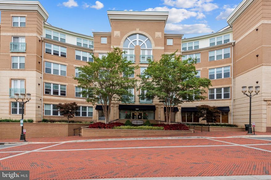 Beautiful 1-bed, 1-bath ground level unit in sought after Savoy at Reston Town Center. Enter to gleaming upgraded flooring, crown molding and recessed lighting throughout the light filled unit. Chef’s kitchen boasts gorgeous cabinets, stainless steel appliances, granite countertops, and breakfast bar to enjoy your morning coffee. The open floorplan with spacious living and dining area is perfect for hosting dinner parties and entertaining guests. Generously sized owner’s suite boasts dual closets and luxurious ensuite bath offering contemporary floating vanity, tiled floors and an oversized tiled walk-in shower with rainfall shower head and handheld wand combo. Step outside to the patio backing to a private courtyard, perfect for creating your own private oasis for evening relaxation. Assigned parking spot conveniently located directly across from the elevator closest to unit. Pet friendly condo with endless amenities including secured lobby, contemporary club room, fitness center, community pool, media room, bike storage, front desk concierge, courtyard with grills to enjoy a summer BBQ, and much more. Less than a mile to Target, Trader Joes and Harris Teeter. Easy access to Reston Hospital, Wiehle-Reston East Metro station (silver line), and Dulles Airport. Enjoy all The Reston Town Center has to offer with endless, shopping, entertainment & restaurant options. Don’t miss this rare find!