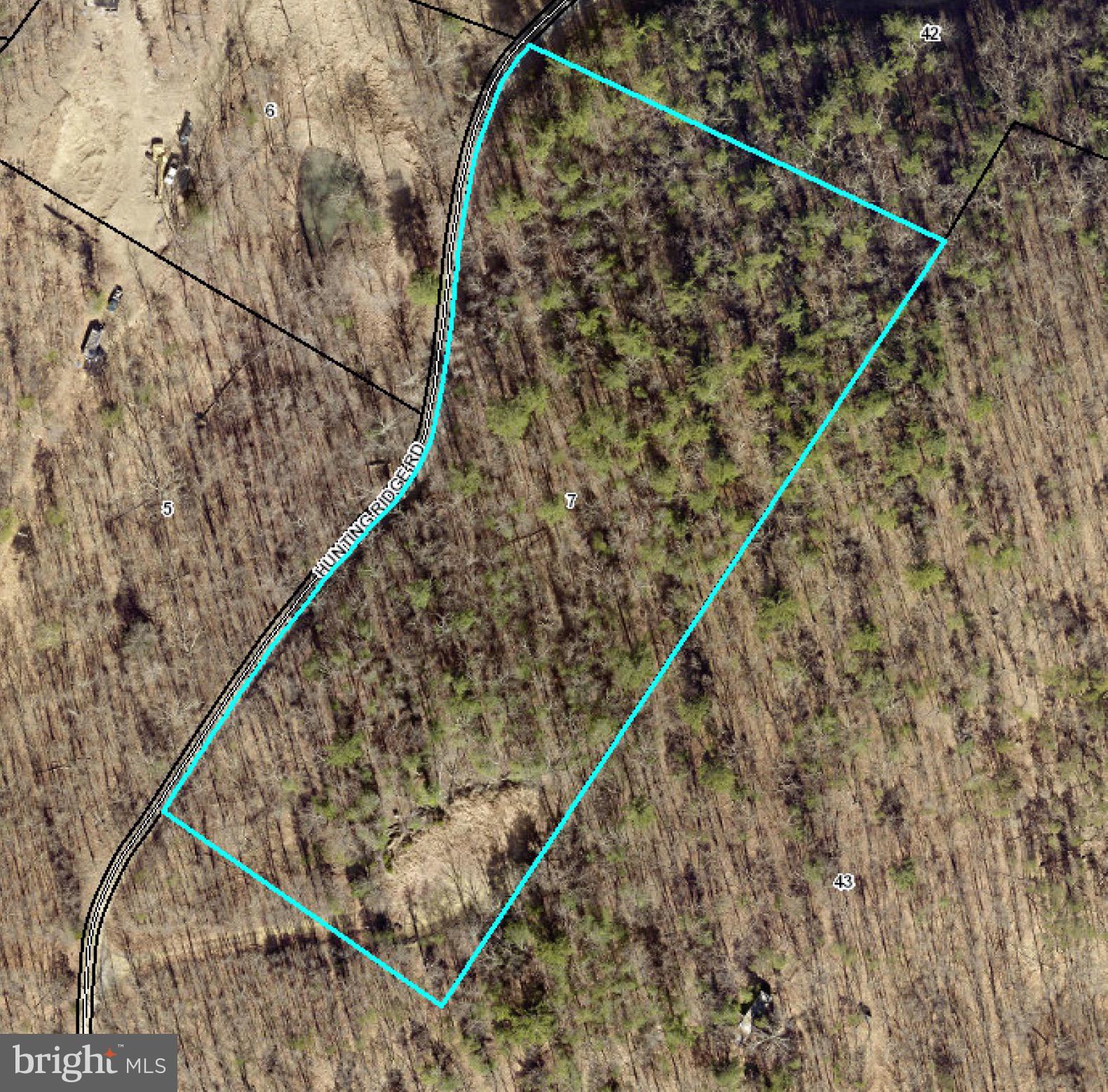 Discover the perfect blend of seclusion and convenience on this 5.06-acre lot, already equipped with electric access, a well, and septic—ready for your dream home or recreational getaway. Tucked away in a serene and private setting, this lot offers easy access to nearby amenities and is ideal for those seeking tranquility without sacrificing convenience. Whether you’re planning to build your forever home, a cozy cabin, or use the land as an outdoor retreat, this beautiful, wooded property offers the opportunity to explore, hunt, or simply enjoy the peace and quiet.