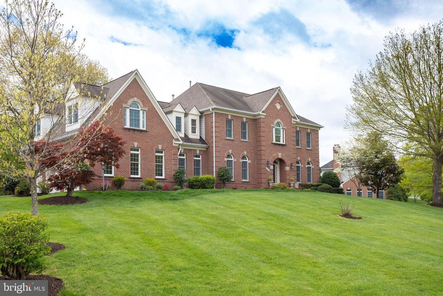 SPECTACULAR BRICK COLONIAL ESTATE HOME WITH EVERYTHING YOU WANT!!! 3 SIDES BRICK ON THE FRONT OF THE HOUSE. 10' CEILING ON THE MAIN FLOOR. ANOTHER  9' ON THE OTHER FLOORS, HARDWOOD FLOORS THROUGHOUT, OPEN FLOOR PLAN, GOURMET KITCHEN WITH CHERRY COLOR CABINET FINSIH CONTRAST WITH BLACK FINISH APPLIANCES..GREAT STEP-DOWN FAMILY RM W/STONE FP, 2ND STAIRCASE, 5 BRS UPSTAIRS, 5 FULL BATHS. INCLUDED IS A FINISHED BASEMENT w/POSSIBLE 6TH BR/AU-PAIR SUITE & FULL BATH. SEALED WITH A VERY PRIVATE PATIO WITH A LUXURY GAZEBO AND DECK WHICH BACKS TO TREES AND A RECREATION GROUND * TRULY AWESOME *** SHOE COVERS WILL BE PROVIDED WHEN TOURING THE HOME***