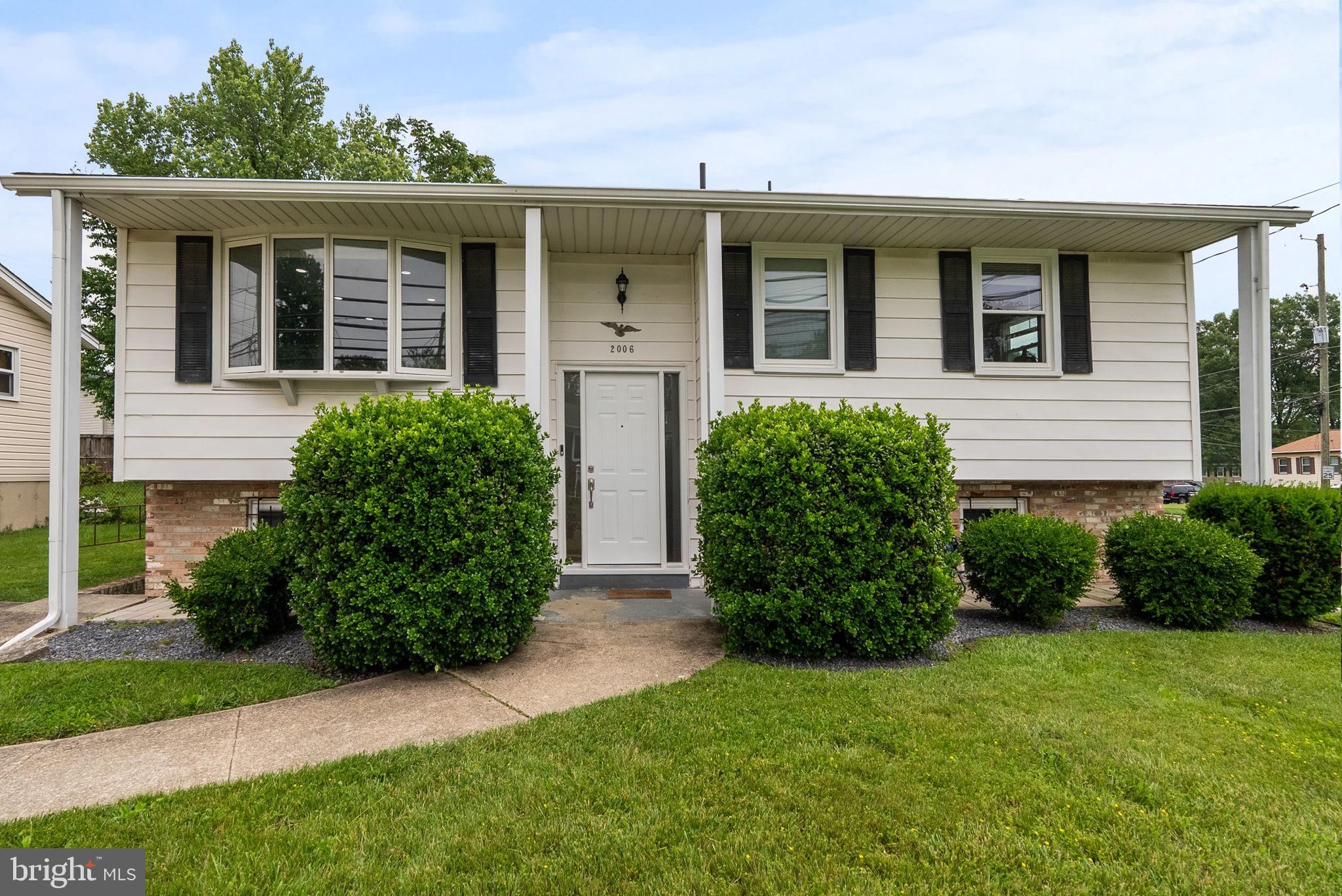Now available is this recently updated 4-bedroom, 2.5-bath split foyer, located in the desirable Holly Springs neighborhood of District Heights. Live proximate to public transportation, major highways, and a diverse array of shopping options.
Step inside this gorgeous home, go upstairs, and be greeted by gleaming hardwood floors and spacious, light-filled living room. Enjoy making meals in the completely renovated kitchen featuring plentiful cabinetry, upgraded counters tops and stainless steel appliances. Have a casual snack at the kitchen island or have a more formal setting in the adjacent dining room. Upstairs you will also find three bedrooms and a tiled bath. Downstairs, the fully finished basement features another bedroom and attached bath, an updated storage and laundry area, wet bar, and a huge living space, perfect for home office, a home gym, or a recreation area. Outside, you will appreciate the huge fenced in backyard and the off-street driveway parking!