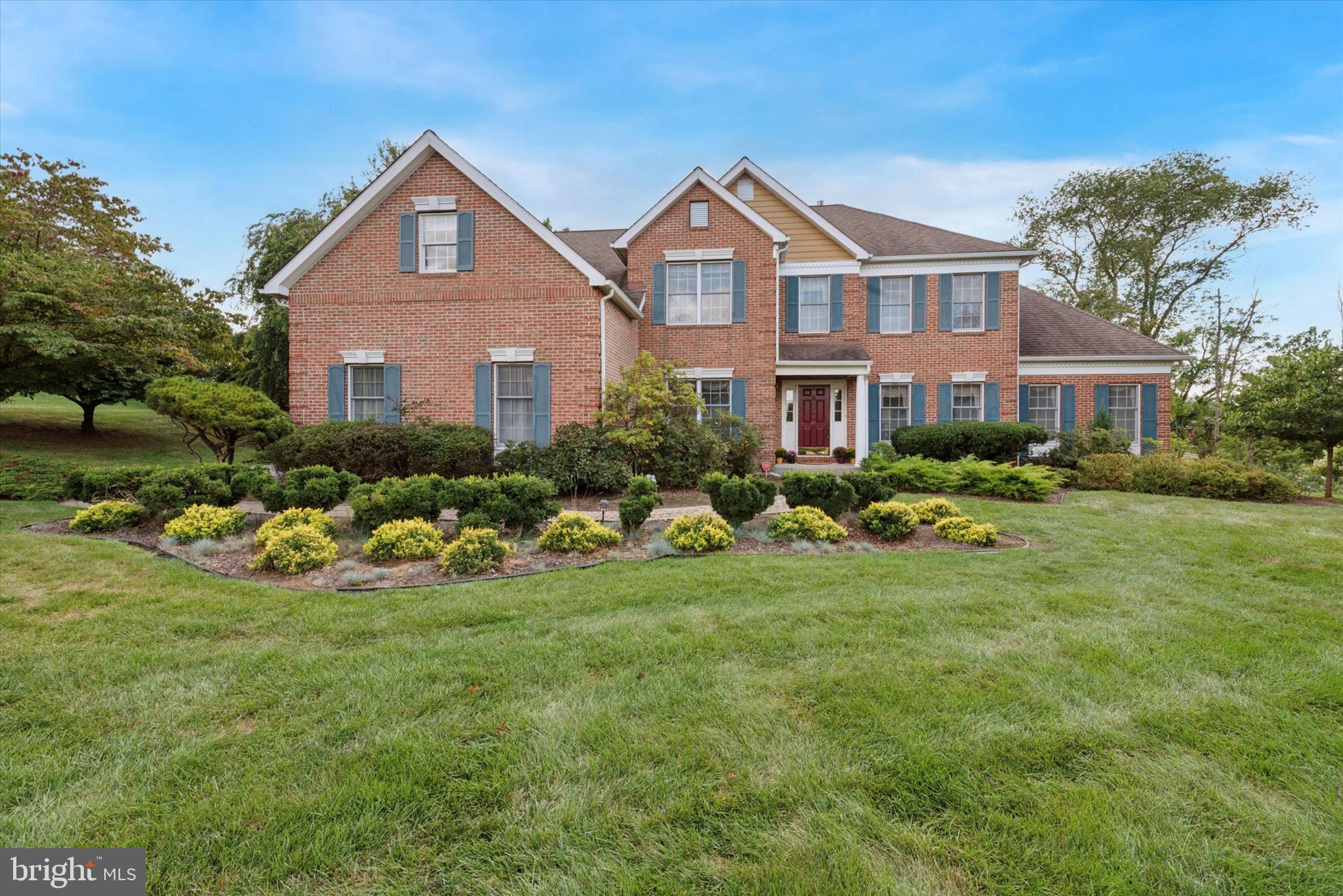 Welcome to 671 Casey Lane in the highly sought-after Thornbury Knoll neighborhood of West Chester!
This Cornell Federal Grand Colonial sits gracefully on a 1.5-acre lot and exudes timeless elegance with a handsome brick front, intricate molding, and a welcoming covered entrance. The exterior is further enhanced by charming brick quainter corners, reflecting the classic architectural style of this distinguished home. Step inside to a bright two-story center hall featuring a striking curved staircase leading to the second floor. To the left, discover a study/office with an entire wall of built-ins, perfect as a home library or workspace. Nearby, a beautifully updated powder room, a double hall closet, and a thoughtfully designed laundry room with a tub, upgraded front-loading washer and dryer, and cabinetry matching the kitchen provide both function and style. The laundry area conveniently connects to a three-car garage equipped with three electric door openers. The heart of the home is the sunlit, expansive eat-in kitchen, designed for both living and entertaining. Stunning woodwork and crown molding frame a center island with a Thermidor gas cooktop, double Viking wall ovens, a wide built-in refrigerator, and dishwasher, all with custom cabinetry to match. The spacious dining area opens to sliders leading to a huge composite deck, overlooking a fenced backyard with mature landscaping, creating a serene outdoor retreat ideal for gatherings or quiet relaxation.
Adjacent to the kitchen, the fireplace-adorned family room features vaulted ceilings, skylights with automatic shades, and charming back stairs to the second floor. To the right of the kitchen, enjoy a formal dining room, a formal living room, and a step-down great room with a cathedral ceiling, all flooded with natural light. Upstairs, the master suite is a private sanctuary with a sitting area, built-ins, a massive walk-in closet, and an exquisite new master bath featuring a glass shower door, a Jacuzzi tub, double vanity sinks with a built-in makeup table. Three additional bedrooms and a full hall bath complete the upper level.
The basement is unfinished but thoughtfully framed and ready for your personal touch. Located in the prestigious West Chester Area School District and served by Rustin High School, this home is ideally situated near Routes 202 and 926, with easy access to Philadelphia, the airport, shopping, dining, and charming local shops in West Chester and Media. From the sophistication of its interiors to the stunning views from every window, this home truly captures the essence of comfortable, elegant living. You’ll fall in love the moment you step inside!