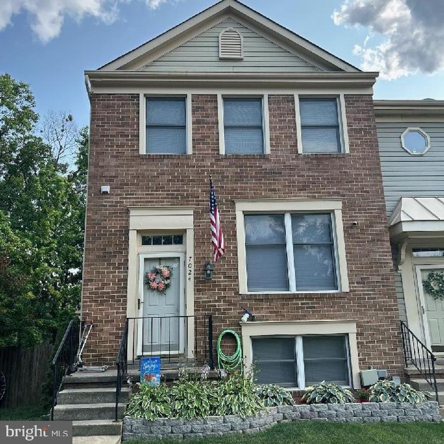 Fantastic brick front end unit offering four-bedroom, fully finished basement with fireplace, fourth bedroom in lower level. This home offers new flooring throughout with open floor plan and dining area. Home shows well from top to bottom with finished family room area with walk out to rear fenced yard.  Home offers plenty of parking which is a plus for entertaining guest. This home is located in water privileged community offering piers, beach area, common areas, RV and boat storage, marina with water and electric, playgrounds and much more. Home is conveniently located and an easy commute to all major cities, roadways and airport. Owner is leaving security cameras with sale. This one is ready for its new owners. Home easy to show so don't miss out.