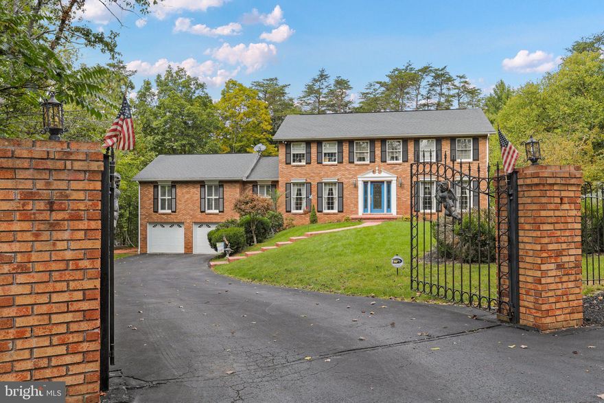 Wow! This Stately Oldtown Colonial is IMPRESSIVE!!! Nestled behind grand iron gates, this stately 5-bedroom, 3.5-bath colonial exudes a rare blend of classic charm and modern convenience. Situated on a beautiful .49 acre lot, this residence offers a private sanctuary amidst nature's embrace.  
Just inside the glistening lead glass front door is an inviting tiled foyer with a lushly carpeted formal living room to the right and a cozy secluded home office to the left. Strait through the foyer is a classic oak kitchen complete with solid surface countertops, a breakfast area, and pantry. Off the kitchen (the true heart of this home!) you'll find many rooms. This first of which, to the right, is a grand formal dining room  with fireplace that can comfortably accommodate a table for 10 and still have plenty of room for your china cabinet and sideboard (truly an impressive setting for formal entertaining). The second room off the kitchen is a lovely sunroom radiating with natural sunlight. To the left of the kitchen you'll discover a main level half bath, laundry room, game room, AND  an expansive family room featuring a propane fireplace and loads of natural light hidden behind beautiful interior shutters. Going Upstairs; The large primary suite offers a serene retreat, with a large walk in closet. Down the hall you'll discover 4 more spacious bedrooms and a hall bathroom. Going to the basement; At the bottom of the steps you'll find a large walk-in cedar closet, a sprawling unfinished basement with a full bath just waiting on your finishing touches , and a spacious two-car garage. Outside you'll find a lovely, yet manageable yard, with a gazebo and woods all around. Don't miss this one! Homes like this don't come available often and this one is priced to SELL!
**MORE PHOTOS COMING MID OCTOBER AFTER CONTENTS REMOVED**