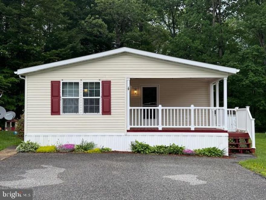 Affordable move-in ready opportunity! 3-bedroom, 2 full bath manufactured rancher located in the friendly community of Forest Glen Court with close proximity to Rt 40, I-95 and the Delaware State Line. Vaulted ceilings and crown molding is featured throughout with a spacious, open and airy floor plan. Highlights include a sizable living room, sitting room/home office/playroom (you decide!), kitchen, full bath, laundry room, 3 bedrooms (all with walk-in closets), including a primary with an attached bath. Kitchen details include an island, skylights, pantry, propane cooking, plenty of cabinetry and prep space, in addition to a large eat-in area. Ideal for entertaining and family gatherings! Exterior features include a gardening shed, landscaping and roomy covered front porch. Upgrades include an architectural shingled roof and new skylights added in 2017, as well as a new HVAC system added in 2022. Ground Rent is 525.00 monthly and includes sewer, and snow removal on the streets. Buyer must receive park approval from Forest Glen Court (see documents for application). Seller provided HWA One year Home Warranty.  If you are searching for a well-kept, conveniently located, affordable place to call home, your search is over...16 Doe Drive...Welcome Home!!!