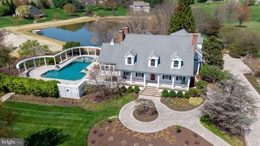 Unmatched Luxury in Western Howard County

This is a RARE opportunity to own one of Howard County’s most exclusive estates! Nestled on 5 pristine acres, this One-of-a-Kind Southern Cape Cod masterpiece redefines luxury living with 5 generously sized bedrooms, 4.5 bathrooms, and exceptional indoor-outdoor spaces that elevate every lifestyle.

From the moment you arrive, you're welcomed by award-winning landscaping, a grand concrete paver driveway, and a wide Southern-style front porch that opens to a stunning foyer wrapped in fresh 2024 designer paint and gleaming refinished cherry hardwood floors throughout.

The heart of the home continues to impress with a fully finished on-grade basement complete with its own kitchen ( perfect for in-law or guest accommodations) , a professional 9 -foot pool table, and a dedicated movie room featuring leather recliners, projector, and screen that all convey.

Outside, your private paradise awaits. The 1.5-acre, fully deeded private pond—fresh off a $1.5M reconstruction in 2024 by Howard County Contract #D-1177—is stocked with bass and ideal for your PRIVATE fishing or canoeing experience. Cascading waterfalls and a koi pond feed into the pond, creating a tranquil backdrop for everyday living or unforgettable events.

The resort-style outdoor living space features an expansive heated saltwater pool with new (2025) primary pool pump, spa, and fiber-optic lighting with adjustable colors, plus brand-new fire bowls (2025) for a truly dramatic, one of a kind nighttime experience. Entertain in style on the upper-tiered patio with a full outdoor chef’s kitchen, complete with Viking appliances, a wok, dual sinks, grill, two-burner stove, ice machine, and kegerator.

Additional outdoor highlights include:

    New whole-house generator and transfer switch ( winter 2024)

    Outdoor sound system

    Extensive low-voltage LED landscape lighting (all bulbs replaced in  fall 2024)

    Backyard walking paths and gardens

    Fenced area perfect for a playground or volleyball court

Other recent major updates:

    Primary kitchen refrigerator (2024)

    Main and basement level HVAC system replaced (2019)

    Well pump replaced (2017)

This estate is not just a home—it's a lifestyle. Located in prestigious Western Howard County, it offers unparalleled seclusion, timeless charm, and modern convenience all in one exquisite package. Whether you're hosting a grand celebration or enjoying a peaceful evening by the pond, this property is truly unmatched.

Do NOT miss this once-in-a-lifetime opportunity to own one of the finest private residences in Howard County.
Call Rebecca Mason at Cummings & Co today for your private tour!