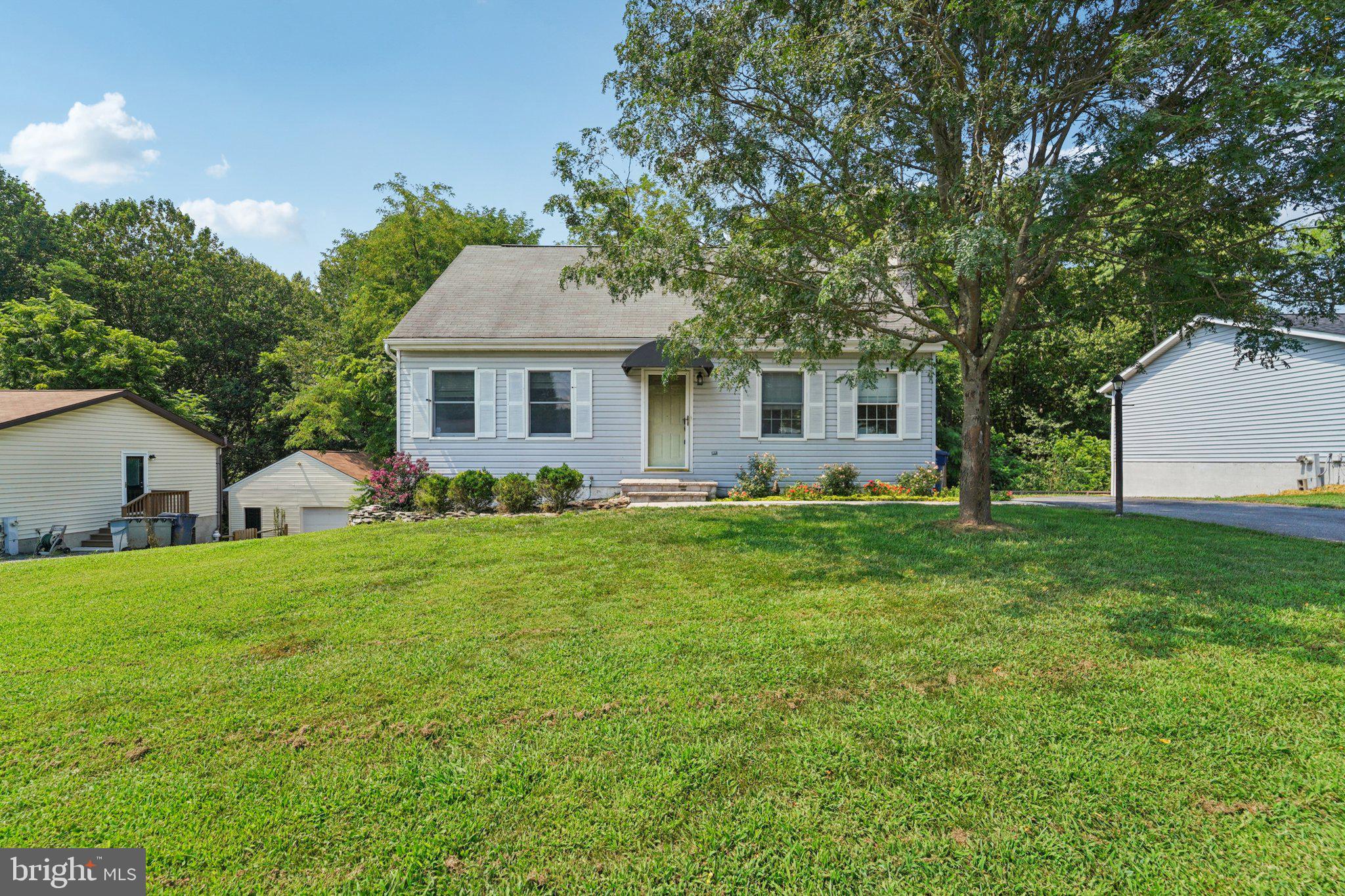 They Say Location Is Everything — But the Home Matters Too, and This One Truly Delivers!
Located in the sought-after town of Sykesville, this beautifully updated 4-bedroom, 2.5-bath Cape Cod is ready for its next family to move in and enjoy. The sellers have spared no expense, with upgrades throughout including all-new flooring, a brand-new HVAC system, and new appliances.
The kitchen has been completely transformed with a stunning center island, passthrough to the living area, and all-new finishes. The main-level bathroom has also been fully remodeled and is sure to impress.
Downstairs, you'll find a fully finished basement, perfect for a rec room, home office, gym, or guest space — offering even more room to spread out and enjoy.
Outside, enjoy new decking, a custom cocktail bar, new steps, siding, freshly laid sod, and a brand-new retaining wall — all designed with entertaining and curb appeal in mind.
This is not just a house — it’s a move-in ready home in the heart of Sykesville, with all the major upgrades already done for you!