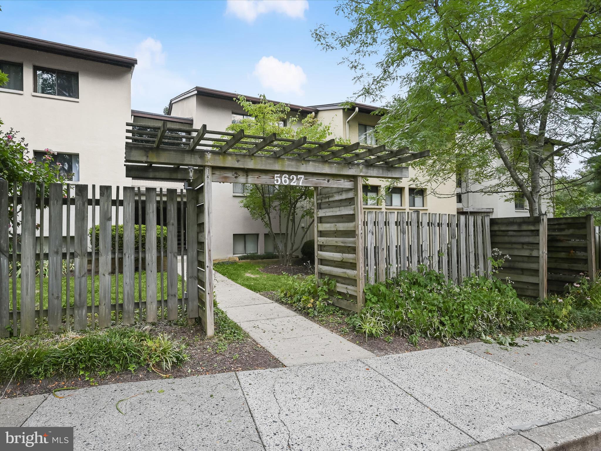 Nestled in the serene Deering Woods community, this charming 1-bedroom, 1-bathroom garden apartment offers a perfect blend of comfort and style. Step inside to discover a warm ambiance enhanced by traditional architectural details, including elegant chair railings and rich wood floors. The open floor plan seamlessly connects the dining area to a well-appointed kitchen, featuring upgraded countertops and stainless steel appliances, making it ideal for both everyday living and entertaining. Enjoy your morning coffee on the private balcony, surrounded by tranquil views of lush trees and woods. The convenience of in-unit laundry adds to the ease of living, while the association takes care of exterior building maintenance and lawn care, allowing you to relax and enjoy your home. With ample on-street and parking lot options, accessibility is a breeze. Experience the comfort and charm of this delightful residence, where every detail invites you to unwind and feel at home. Recent updates include a new HVAC, water heater, electric panel, and fresh paint.