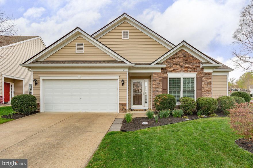 Situated on a spacious corner lot in the sought-after Active Adult community of Falls Run, this beautifully staged Chesapeake model with a loft is ready to impress. From the moment you step inside, gleaming hardwood floors lead you through a thoughtfully designed floor plan. To the right, a versatile home office or den provides a quiet retreat, while a nearby guest bedroom and full bath offer a welcoming space for visitors.  

At the heart of the home, an expansive dining area seamlessly connects to the family room, where vaulted ceilings and large windows frame picturesque views of the exceptional lot. The kitchen is both functional and stylish, boasting quartz countertops, a custom backsplash, light oak cabinetry, and ample cupboard and counter space. A cozy informal dining area opens to a charming three-season room, perfect for relaxing and enjoying the view. Nearby, a generously sized laundry room with two closets provides extra storage for household essentials and is the perfect entrance coming in from the garage. 

The primary suite is a private sanctuary at the back of the home, bathed in natural light from sun-filled windows. The remodeled ensuite bathroom features dual vanities and a custom walk-in shower, offering both comfort and elegance. Upstairs, the loft presents endless possibilities, with two flexible spaces ideal for an art studio, exercise nook, or additional den. A third bedroom and full bathroom complete the upper level, making this home perfect for hosting family and friends.  

Designed for those who want to enjoy an active and engaging lifestyle, Falls Run offers an array of amenities just a short stroll from your doorstep. Sidewalk-lined streets lead to the vibrant community center, where residents enjoy pickleball, billiards, fitness classes, indoor and outdoor pools, and a well-equipped exercise room. A full-time Lifestyle Director ensures a calendar filled with exciting activities and social opportunities.  

With its spacious layout, prime location, and access to fantastic amenities, this home proves that downsizing doesn’t mean sacrificing comfort or style. Come explore all that Falls Run has to offer and make this exceptional home your own!