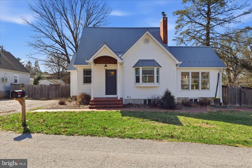 Delightful Cape Cod home full of warmth and character.  The main floor features two spacious bedrooms and a full bathroom, hardwood floors, an inviting living room with a cozy fireplace, a bay window, and a dining room. The kitchen is everything the home chef could ask for with tile floors, granite counters, and a pantry. A lovely sunroom with vaulted ceilings and doors to the patio completes the main level. A third and large bedroom is situated upstairs, with a full bathroom and convenient laundry. Step outside to your private patio, where you can unwind or host gatherings in your expansive 0.48-acre fenced yard, which overlooks a pond, and is complete with a handy shed for all your gardening tools. ALL NEW in 2018: septic, metal roof, heat pump and duct work, mini split in sunroom, siding, soffit, fascia, spouting, some windows and doors, bath, flooring, privacy fence. This property is not just a house; it's a place to create lasting memories. Don't miss the opportunity to make this charming home your own!
