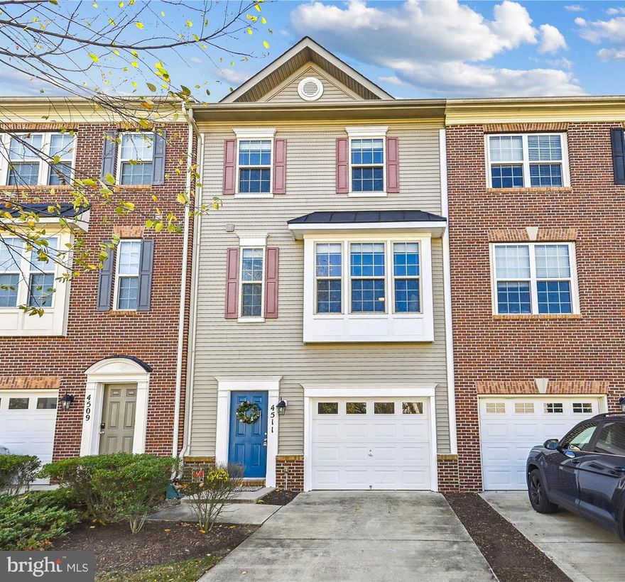 Competitively priced, just refreshed and move-in-ready! Perfectly located just blocks from Quantico and I-95. Peaceful, well-maintained community. This modern 3-level Townhome features a one car garage with an additional parking spot right in your own driveway! The entry level off of the garage features a large flexible recreation room that has a slider to the backyard, and a powder room. Perfect for entertaining guests. Through the foyer and upstairs you'll find hardwood floors throughout this level. You will love your sleek open kitchen with granite counters, stainless steel appliances, prep island and space for a dining table. You have a private deck off the dining area that is fully composite for easy care. The living room is expansive and sunlit with oversized windows exposing views of your tree-lined street. There is another powder room on this level for your convenience. Upstairs in this freshly-carpeted bedroom level is your large primary suite with walk-in closet and dual-sink vanity in the primary bathroom. The other two bedrooms share a well-equipped hall bath. The laundry is up here too! HOA/Condo fees include Water/Sewer, trash/recycling, exterior maintenance, lawn care and use of community amenities including outdoor pool, tot lot and walking paths. Special financing is available through Project My Home to save you money on closing costs. Home is currently enrolled in a premium home warranty with the option to transfer to buyer at closing.