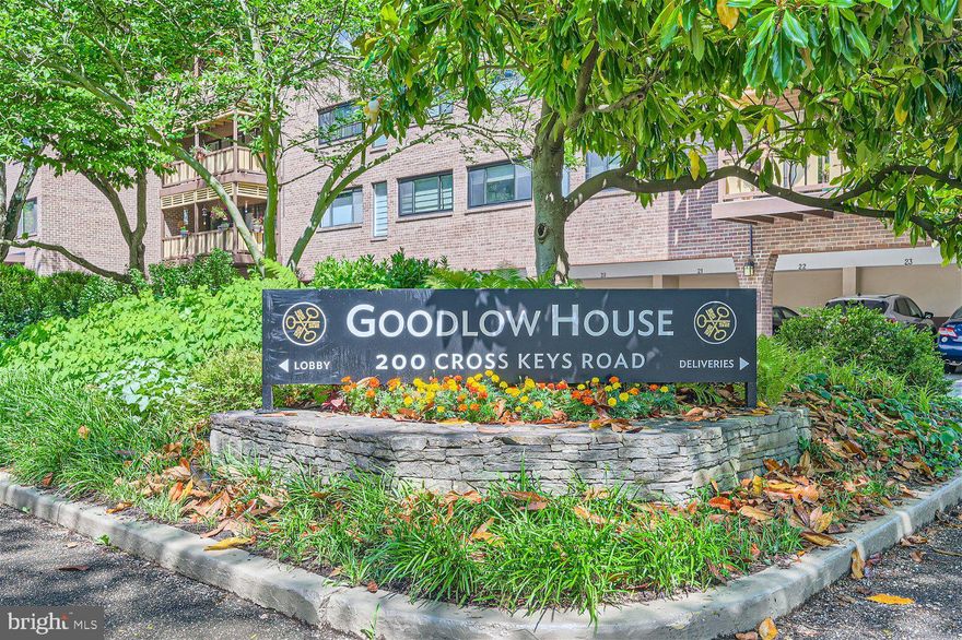 This corner 2 bedroom, 2 bath  has an extra window facing west and a spacious balcony with lovely treetop views.  Large windows throughout make this place light filled.  There are parquet floors throughout  and some are covered by carpet.     There is one COVERED  parking space in the above grade carport. behind the building.   ALL UTILITIES ARE INCLUDED IN CONDO FEE!   This  non -smoking, no pet , building is quiet and well maintained with a very healthy reserve fund and two elevators. 

Cross keys is in the midst of a renaissance and there are new eateries, shops and spas opening daily.   Enjoy one of three pools, the pickleball / tennis court, walking trails and gated entrance.  This apartment on the north side of the building overlooks treetops and with a little sweat equity could be a showplace.