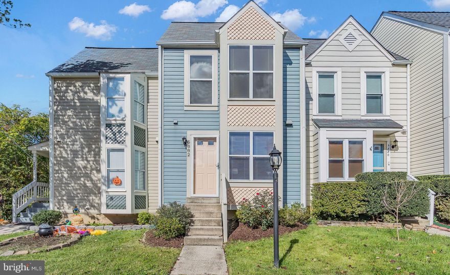 This is the one! This beautiful townhome in commuter friendly Kingstowne, Alexandria is ready to welcome you home! As you arrive, you'll notice a private wooded setting within the community and plenty of parking. Thoughtfully landscaped with roses, lavender, and a butterfly bush, this home gives a warm, lively cottage vibe as you walk in.

On the main level, you'll find a sun soaked kitchen with stainless steel appliances and space for a coffee bar, mobile island, or a breakfast nook. You'll also notice inviting hardwood floors and an open concept dining/living room area. This space is perfect for winding down or entertaining with a wood burning fireplace and expansive deck that overlooks community greenspace. See if you can spot one of the neighborhood bunny rabbits! 

Upstairs, cozy carpet, a soaking tub, and high ceilings all make for a relaxing space to unwind. The primary bedroom also caters to convenience with plenty of storage space and a separate vanity.  

The lower level features a private suite with exterior access as well as a large utility/laundry/storage room with included shelving for easy organization. The third bedroom is located on this level along with its own full bathroom. Built-in shelving is also provided along with two closets for additional storage. Walk out to your fully fenced patio which also leads to the expansive community greenspace - perfect for some fresh air and a nature walk!

This home will be freshly painted and deep cleaned (including the carpets) before tenant move-in. This property can also be offered furnished if desired. 

Commuters can enjoy a short walk to the neighborhood bus stop and close proximity to the Springfield/Franconia Metro Station. This convenient community is a short trip to the Kingstowne Shopping Center, Springfield Town Center, Amazon Fresh, Nalls Produce,  and many other shopping and entertainment options! Community amenities include an outdoor pool, walking/jogging paths, and a fitness room.