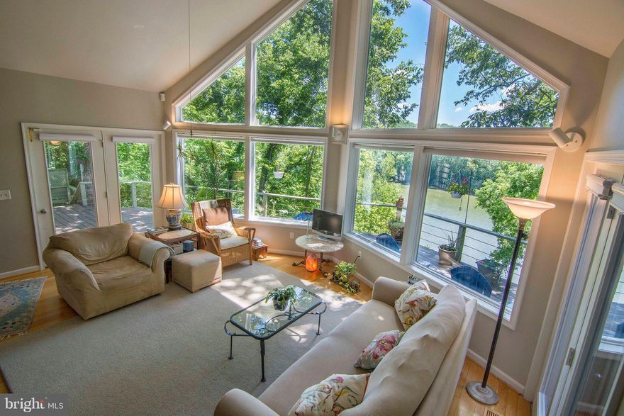 REDUCED! Contemporary w/main level master bedroom sits on a private 1.7 acre lot on private rd off Whitings Neck Rd.  167' of Potomac River deep water frontage with access rd to boat launch and flat owned land, views in all directions. C&O National Park, across the river and adjacent nature preserve.  Near Historic Shepherdstown. NEW BULKHEAD, PIER  W/STAIRS ready for your water enjoyment!