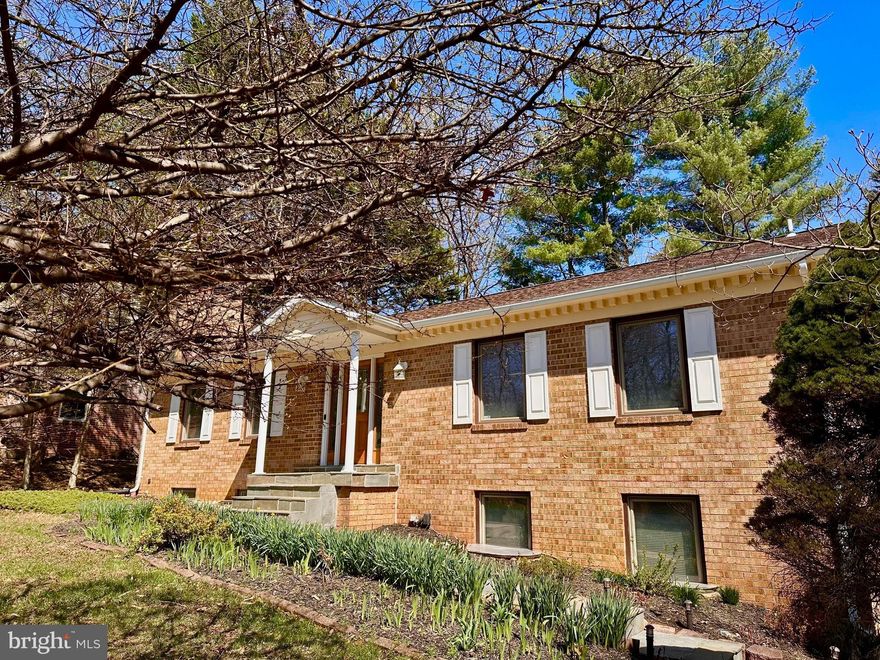 OPEN SATURDAY 4/4 1-3 PM!
BEDFORDSHIRE RAMBLER SHOWCASE WITH GLORIOUS GARDEN OASIS 
A stunning garden paradise oasis is the crown jewel of this beautiful 4 BR 3 BA Bedfordshire rambler, a rarely available home in the Churchill HS Cluster.  Sited on a .37 acre lot bordered by a community creek and across from an idyllic local park, this home boasts updates galore including renovated bathrooms and kitchen, and hardwood floors throughout main level.  Enjoy all the advantages of MAIN LEVEL LIVING with owner’s suite and guest bedrooms on kitchen level and walk out to the glorious year-round garden! Additional upgrades include all new insulation (2025), nine new doors, and beautifully repainted interior. 
The OPEN KITCHEN overlooks the dining room and backyard with country chic cabinetry, tile backsplash, granite countertops, all Samsung and Bosch appliances including electric stove with double oven, spacious kitchen island with breakfast bar and additional storage. Skylight sun tunnels bring the daylight in for maximum brightness, and an ALL-SEASON SUNROOM overlooks the spacious newly refinished wood DECK with flagstone patio, attached shed for extra storage, and terraced gardens, while the family room features a gas fireplace with tiled hearth for cozy nights in. 
OWNER'S SUITE with ceiling fan, oversize built-in closets with adjustable shelving, and all upgraded ensuite bathroom with walk-in shower, porcelain tile, dual sinks and modern vanity, and additional built-in closet space. Hardwood floors extend to second and third bedrooms as well, with additional skylights and completely remodeled hallway full bathroom with tile shower. Attic storage space features pull-down stair access. 
Downstairs features spacious FAMILY ROOM with tile floor, brick gas burning fireplace, window wells to bring in extra daylight, and access to one car garage with extra space for parallel parking outside on parking pad. Shelving in garage conveys. Extra bedroom in basement with own entrance, and additional full bathroom, and laundry room in basement with extra storage. The lovingly planted GARDEN  is designed for year-round color with springtime bulbs including daffodils, tulips, magnolias, azaleas, magnolias, Asian plum, maples, crepe myrtles and more.
Located in a prime Potomac address minutes to Potomac Community Center, Potomac Village, Cabin John, Park Potomac, I-270 and 495,  across the street from Bedfordshire Neighborhood Park, a 7.8 acre park with trails, basketball courts, playground and tot lot, this sophisticated Gem in Potomac will delight the most discerning buyers!