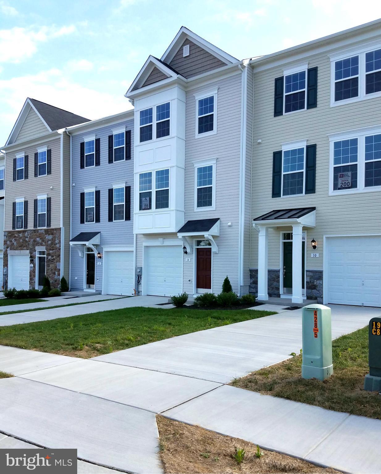 Dan Ryan Builders Riverside Villages offers a new set of Yorktown II 3level garage townhomes for IMMEDIATE DELIVERY! Buy yours now! This unit with 2 story box bay is huge - over 1900 sq.ft. with 8' Morning Room expanded plan featuring an open island kitchen/dining with stainless appliances, luxurious Owners Suite, spacious 2 room lower level, energy efficient 2x6 walls! Minutes to MD line!