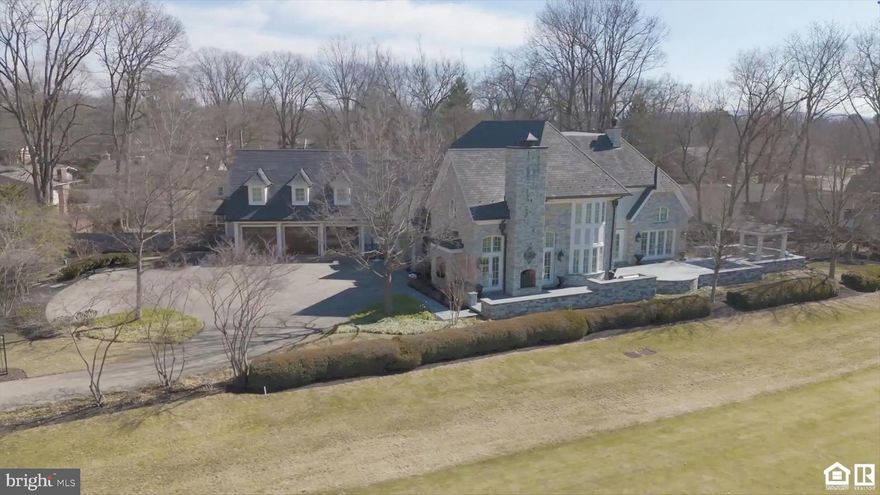 Welcome to your ultimate home or luxurious weekend getaway! Less than 50 miles from Washington, DC! This stunning estate on a pristine golf course offers unparalleled elegance and relaxation. With breathtaking views, sophisticated interiors, and top- notch amenities, this home is perfect for both entertainment and serene retreats. Imagine unwinding in your private oasis, surrounded by lush greens, or hosting memorable gatherings with friends and family. This is not just a home; it’s a lifestyle upgrade waiting for you!
This estate, spanning over 6,000 square feet, situated on the desirable Donald Ross golf course is more than just a home – it's an experience.
As you approach through the iron gates and long circular paver driveway, you will be amazed by the sight of this magnificent solid Fieldstone masterpiece.
Each handcrafted stone tells a tale of incredible workmanship, and the solid Mahagony front doors harmonize perfectly with the matching garage doors.
Step onto hand-hewn solid cherry hardwood floors, ingeniously heated, providing both warmth and luxury underfoot. Every corner exudes craftsmanship, with Petersheim cabinetry and intricate moldings setting the tone.
The living room, embellished with custom built-ins and solid wood doors, serves as the perfect gathering place. Three gas fireplaces throughout this beauty create intimate spaces, each with its own character and charm.
At the heart of this incredible home lies the ultimate gourmet kitchen, second to none... a cook's dream, where custom cabinetry some with leaded glass, a new maintenance-free soapstone island paired with granite countertops, multiple refrigeration systems, and top-tier appliances create a chef’s experience beyond compare.
Take the stairs or elevator to the upper level, where a private in-law suite awaits with its own mini-kitchen and living room. The upper level also houses a beautiful study and two guest suites that overlook the perfectly manicured grounds of the golf course.
The primary suite on the main level is a sanctuary in itself. Every element here is designed for rest, relaxation, and opulence.
But that's not all.  
Step into the office/library. This clean air filtered, climate-controlled workspace hosts wall-to-wall solid cherry built-ins and a secret temperature-controlled wine room that stands ready for your vintage collection. And yes, for the connoisseur, a humidor/gun closet lies discreetly tucked away.
Outside, experience alfresco luxury with a superior outdoor kitchen under a mahogany-ceilinged pergola. 2,000 square feet of outdoor entertainment space enables you to gather around the large gas fire pit. Among other high-end appointments is an oversized Viking Grill. The outdoor realm resonates with the flicker of one switch-all gas lighting. Revel in the beauty of natural fieldstone and exotic bluestone slate flooring from Brazil.
Every facet of luxury living has been meticulously curated in this residence. With the foresight of two 1,000-gallon propane tanks, you are guaranteed consistent, uninterrupted warmth on the chilliest of nights. And the luxury doesn't end there; imagine stepping into any bathroom or kitchen and instantly being greeted with hot water, a testament to the home's commitment to unparalleled convenience comfort and grandeur in every corner.
And for your vehicles, the attached heated, oversized three-car garage, with new mahogany doors and durable maintenance-free interlocking floor tiles ensures your chariots too are enveloped in luxury.
A 50-year slate-like rubber shingle crowns this home and symbolizes durability and sophistication. It's the detail, the artistry, and the luxury that sets this home apart. Adjacent lot available for additional price.