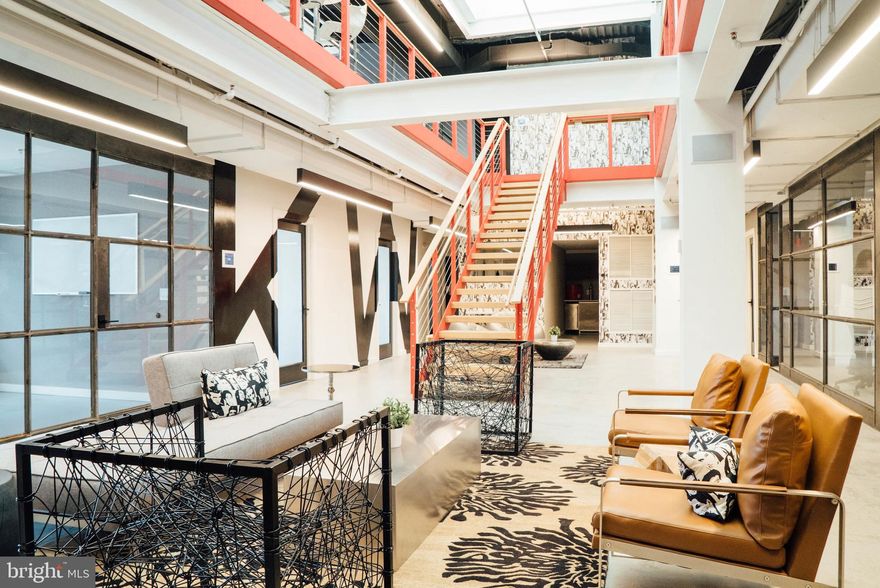 728 S Broad Street | Philadelphia, PA

Commercial Condominium – 3rd & 4th Floors



Positioned along South Broad Street, this modern, light-filled commercial condominium offers a fully built-out office environment designed for both collaborative work and private operations. The offering includes the third and fourth floors, currently leased at $23,371/month NNN with approximately 2.5 years remaining and structured annual increases—providing immediate, stable income.



Access is streamlined through a secure, app-enabled entry system, with both elevator and stair access.



The entry level opens into a welcoming reception and lounge area with a thoughtfully designed coffee bar and informal seating. From this central point, the layout extends seamlessly to both sides, featuring three expansive, glass-lined conference rooms and ten private offices, all benefiting from strong natural light and an open, connected flow.



Toward the rear, a dedicated kitchen and a well-appointed multi-stall restroom suite support the overall functionality of the space while remaining discreetly positioned away from the primary work areas.



The upper level continues the same clean, open design, centered around a skylit opening that brings natural light through both floors. This level is designed for productivity at scale, featuring an open workspace accommodating approximately 20 workstations, along with a raised work bar with high-top seating. Surrounding this area are ten additional private offices, two conference rooms, and two private restrooms, creating a strong balance between open collaboration and enclosed workspace.



The building’s industrial-modern aesthetic exposed structure, skylights, and clean finishes creates a professional, polished environment. A new roof completed in 2026 adds to the property’s long-term stability.



Located directly on South Broad Street, one of Philadelphia’s primary commercial corridors, the property offers exceptional accessibility for commuters. The site is easily reached via the Broad Street Line, multiple SEPTA bus routes, and is just minutes from Center City, Avenue of the Arts, and major thoroughfares including I-76 and I-95. Surrounded by a mix of residential growth, retail, and established businesses, this location supports both employee convenience and long-term tenant demand.



This is a rare opportunity to acquire a fully leased, design-forward office condominium in a highly accessible and well-connected Philadelphia location.