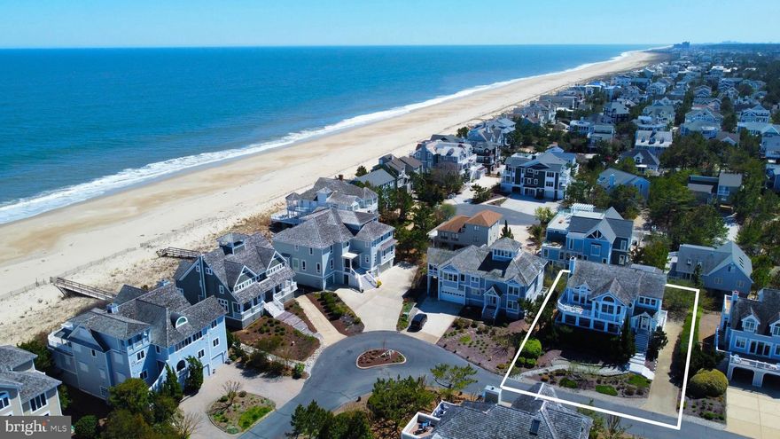 Crafted with the highest level of quality and attention to detail, this exquisite home is only steps from one of the most desirable private beaches on the Delaware Coast. Elegantly appointed with upscale finishes, fixtures, and furnishings throughout, this home is the epitome of luxurious coastal living. The spacious open floorplan features an impressive great room with peaks of the ocean, soaring ceilings, skylights, fireplace, additional sitting area, and architectural details throughout. The gourmet kitchen is as functional as it is beautiful with commercial grade appliances, tiled backsplash, high end cabinetry and large center island with Quartz countertops. Just off the kitchen is a large deck for grilling and entertaining outdoors, and off the living area is another deck that offers ocean views and breezes. Also on the main level is a spacious primary bedroom suite with separate office space, and a beautiful bathroom. The middle level features a large family room that opens to a wide covered porch, 2 additional ensuite bedrooms, and 2 bedrooms that share a hall bathroom. The ground level offers a half bathroom, and access to the oversized garage, storage room, and multiple outdoor showers. Located just steps to a pristine private life-guarded beach in the highly sought after gated community of the Preserve with a community pool and tennis courts, this home is offered tastefully furnished and is ready for your summer enjoyment.