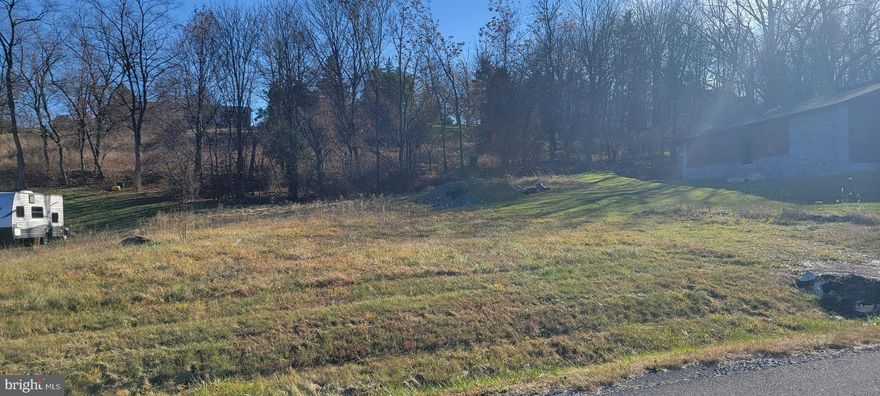 Vacant lot ready to build your dream home by Elevation LLC exclusive builder.  A great development and a community in the country.  Call before viewing!