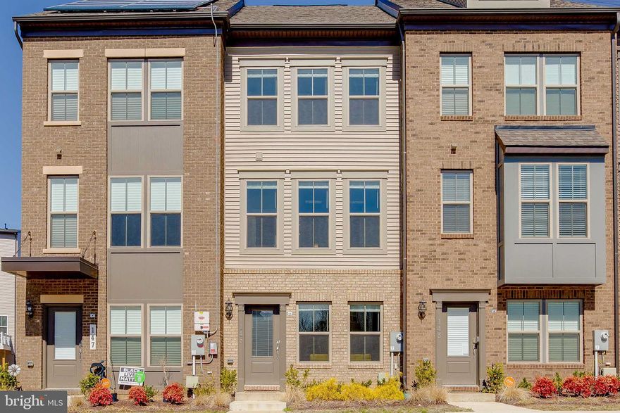 If you missed my previous listing in Capital Court (affordable suburbs, but urban look & feel) here’s your chance to get in now w/another elegant Hugo floor plan, 4-levels, the materials & finishes reflect the latest in design trends. Approx 2040 square feet, what's reported in tax record is incorrect. Pre-wired HDMI. Built in 2020 just over 1.5 years young. 1st floor personalize to meet your needs: office/rec room/wellness room, this space leads to attached 1-car garage w/driveway to park your 2nd car. On the 2nd floor you’ll instantly feel the openness as you walk across the wide-plank flooring where you’ll enjoy the well-appointed kitchen w/ 5-burner gas stove,  sparkling stainless steel appliances, expansive 10 ft island w/pendant lighting as well as recessed lighting throughout. Open concept, the dining room flows into the kitchen & living room which leads to the rear deck, perfect for entertaining. Large windows fill the home with plenty of natural sunlight.  Stylish stair rails upgraded to twist with single basket design. Two of the 3 bedrooms come with an ensuite bath, the spectacular 4th level (yep 4, you’re welcome)  features the primary suite with full bathroom with rectangular double basin, solid surface vanity top with cabinets that maximize storage &  a modern walk-in shower.  Enjoy ease of living in this walkable community, take in the fresh air and Vitamin D, Largo Metro < than 1 mile, library nearby. Onsite gym, clubhouse & play lot. Quick access to all commuter routes, minutes to DC, Alexandria, National Harbor. Please follow CDC COVID-19 guidelines when showing. Please wear mask and remove your shoes.