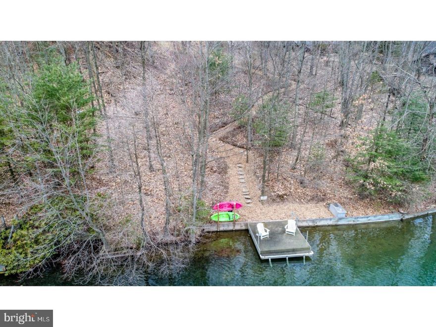 One of the few premier Lake Wynonah lakefront building lots still available! 664 Apache Cove is a perc approved parcel with a beautiful and inviting space for your personalized lakefront home. From the spacious open area above, stroll down through the trees to your dock and waterfront; pathway to lake is a gentle switchback naturally adorned with wood chips. Waterfront is located in a no-wake zone and boasts beautiful views of the lake. A truly desirable and serene piece of property! Perc Test results and Survey available.  Lake Wynonah is a gated lake community, featuring 2 gorgeous, pristine freshwater lakes. Amenities include: business office/gathering room/library, lodge w/dining and bar, social clubs, boating, fishing, wakeboarding, waterskiing, tubing, paddleboarding, tennis, pickleball, several parks/pavillion, shuffleboard, newer basketball courts, horseshoe pits, 2 pools, beautiful docks, hiking, natural wildlife and marina. Groups and events include: Civic Association, Dances/Concerts, Book, Lodge and Pinochle Groups, Volunteer Programs, Fish & Boat Group, Exercise Classes. Located less than an hour from Allentown, Harrisburg and Reading, BEAT THE BEACH TRAFFIC and settle in at the lake!