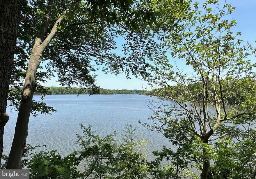 A point of land on the Sassafras River consisting of 5+ acres, approx. 600 feet of waterfront, private dock,  protected shoreline improved by substantial rip-rap,  wide wrap around water views, a three bedroom home  and more....   Easy access to points north or south by car (less than 15 minutes to Middletown DE).  A country setting with local convivences in close proximity.   Protected water for boating and a quick boat ride to restaurants and entertainment.  An ideal location by land and water!