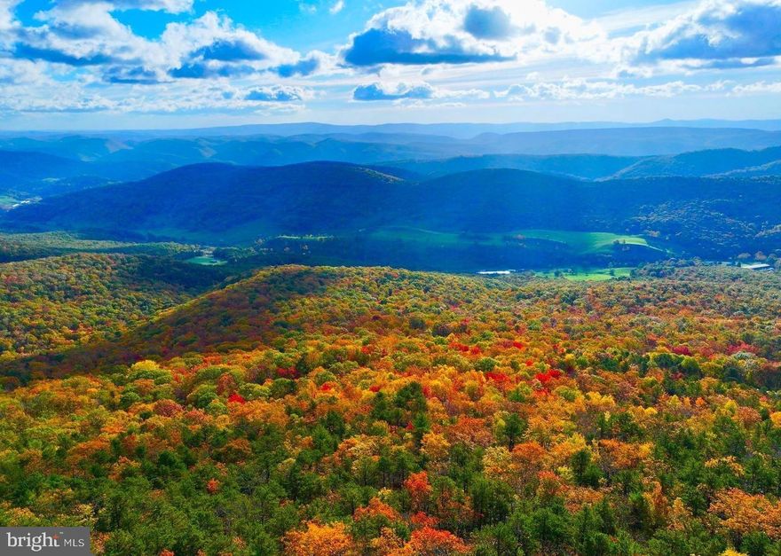 "West Virginia Mountain Property on 14 +/- ACRES" At nearly 4,000 ft in elevation offering some of the best panoramic mountain views this state has to offer. Surrounded by more than 20,000 acres of Monongahela National Forest & 24.7 mile long North Fork Mountain Trail! This raw land offers an ultimate location for a future dream cabin  just off of WV Route 33. Close your eyes, take a deep breath of fresh mountain air, inhale scents of fall, as song birds sing, and picture yourself surrounded by pristine forest as you open your eyes to mountains for as far as your eyes can see.  Recreational opportunities in all directions including miles and miles of state stocked trout fishing water, hiking, skiing, hunting, mountain biking, whitewater rafting, and so much more all within a few miles. 8 miles to Franklin. 15 miles to Spruce Knob (WV Highest Point). 16 miles to Seneca Rocks. 30 miles to Smoke Hole Caverns & Resort. 40 miles to Canaan Valley Resort & Timberline Mountain. 50 miles to Harrisonburg, VA. 70 miles to Shenandoah National Park.