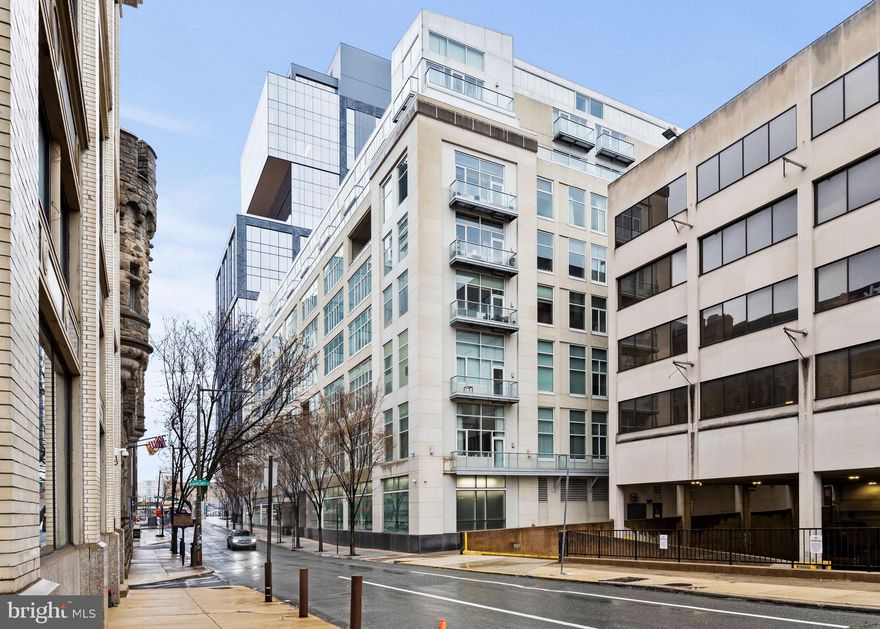 Looking for a pied-a-terre? Medical resident, hospital fellow, or student with little time for the upkeep of a large home? First-time homebuyer? Investor seeking positive cash flow without the worry of vacancy? Presenting 23 Condominiums, one of Philadelphia's finest examples of adaptive reuse situated in Rittenhouse Square, a coveted neighborhood immersed in culture, fine dining and creativity. Originally a garage built in 1900, the building was reimagined into condos in 2005 and now stands tall with sleek glass panels, Italian limestone, and serious curb appeal. This seven-story mid-rise building features 83 units with 24/7 secure concierge, glass elevators with atrium views, terraces, a community garden, and a roof deck that gives you sweeping city views.

Unit 2K is a contemporary second-floor loft with a sun-drenched, well-organized floor plan and unique live/work flexibility for the creative-seeking individual. Architectural elements include hardwood floors, recessed lighting, 11' ceilings and a lovely balcony perfect for a morning cup of coffee or an evening cocktail. The clean and bright kitchen boasts an island for food prep, Viking stainless steel appliances, granite countertops, a subway tile backsplash, and a built-in desk to keep your WFH away from your relaxing space. An elevated loft bedroom makes the layout very comfortable and manageable. A tiled bath with tub and an in-unit laundry closet round out the space. 

Located just blocks from Philadelphia's celebrated Rittenhouse Square, the location is second to none. The prized square dates back to the late 17th century as one of the five original open space parks designed by William Penn. Its lush grass, canopy of trees, and benches serve as a gathering spot during all seasons and the Paul Cret designed entrances and fountain are works of art. Located in the prestigious Greenfield School District, this building is within walking distance to the best the city has to offer. Across the street find the Fitler Club, one of the most luxurious private clubs in the city. Head north to the Art Museum and the Benjamin Franklin Parkway (with an obligatory stop at Trader Joe’s on the way), south to Fitler Square and the beautiful Schuylkill River Park, and west to University City, home of UPenn, Drexel, and CHOP.  30th Street Station is a stone’s throw away for a weekend escape or a part-time NYC commuter. 

This unit is a dream come true for the discerning urban dweller who wants to be in the center of it all, and for the smart investor who knows that real estate in a prime location is the best investment, perhaps now more than ever. 

* Seller will offer pre-paid parking through the end of September giving the buyer the opportunity to renew the lease.