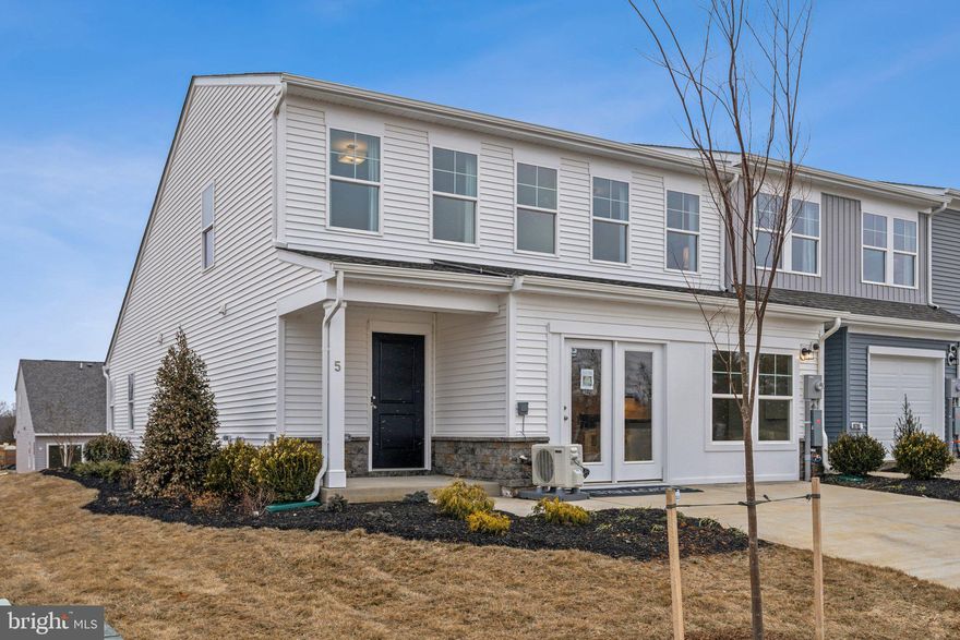 "MODEL HOME FOR SALE!!   The buyer has the option to purchase all the model home furnishings for $10,000. The model will be available to settle on or after December 15th."
STONE SPRING-🏡 MAIN-LEVEL PRIMARY BEDROOM
Welcome to this end-unit Sagamore Townhouse/Villa. This Essence by Stanley Martin home perfectly blends modern comfort with style. The list price is the final price and includes all options and upgrades, ensuring no additional cost surprises!
This beautiful 3-bedroom, 2.5-bathroom home offers 1,877 square feet of living space across just two floors, providing the perfect balance of space and convenience. It features a spacious 2-car garage, ensuring ample storage.
Step inside and be greeted by an open-concept main level that boasts a main-level primary bedroom with an en-suite bathroom, creating your personal oasis complete with all the amenities you need. The main level also includes a sleek kitchen, with quartz countertops with a large island and elegant dining area and inviting family room—an ideal layout for entertaining guests or enjoying quality time with loved ones.
Upstairs, you’ll find two additional bedrooms, both with walk-in closets for tons of storage, plus a well-appointed hall bathroom. When it’s time to unwind, the upper-level flex room is perfect for a home office or 2nd family room.
As the area's number one ranked builder, Stanley Martin homes are built with superior energy efficiency, helping you save on electric bills every month!
Live the Stone Spring Lifestyle:
Perfectly located in Charles Town, enjoy the best of small-town charm and modern convenience:
✅ Walk to Starbucks & the community dog park
✅ Unwind at Harpers Ferry Brewing or explore Harpers Ferry (6 miles away)
✅ Enjoy outdoor fun at Jefferson County Memorial Park
✅ Try your luck at Hollywood Casino at Charles Town Races
✅ Convenient access to Leesburg, VA—just 30 minutes away
As an end-unit, the Sagamore model sells out very quickly so schedule your tour today!
Sales office open Monday, Thursday, Friday and Saturday: 10 AM - 5 PM | 🕛 Sunday: 12 PM - 5 PM  Closed  Tuesday and Wednesday. 
Model homes can be toured during closed hours using our "Self-Guided" access code. To access after hours, use the QR code posted on the model home's sales office front door and follow the directions. You'll be given an access code to unlock the model home to tour.